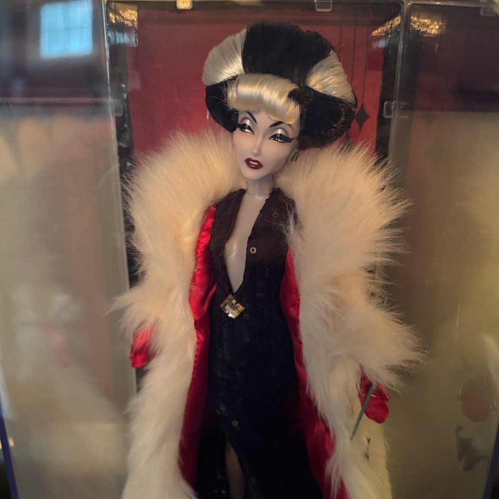 Elegant Black and White Fashion Doll with Red Accents